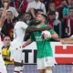 AC Milan defeated Genoa to go top of Serie A despite playing the last seven minutes of their game with forward Olivier Giroud in goal as both teams' goalkeepers were sent off.