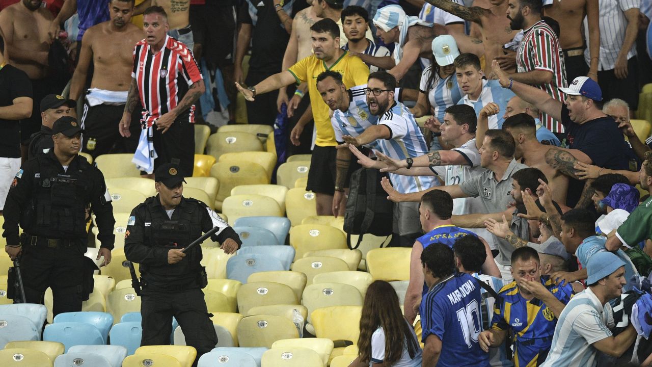 Football's world governing body, Fifa, has opened punitive proceedings after crowd trouble delayed Brazil's World Cup qualifier versus Argentina.