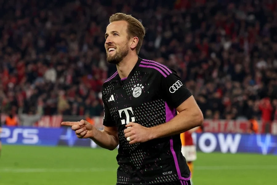 England skipper Harry Kane scored again as Bayern Munich won at Cologne to advance to the top of the German Bundesliga table.