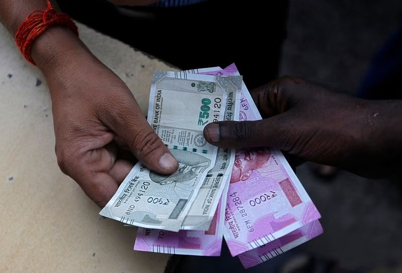 Early on Friday, the Indian rupee showed little change, trading inside a limited range as traders anticipated new clues.